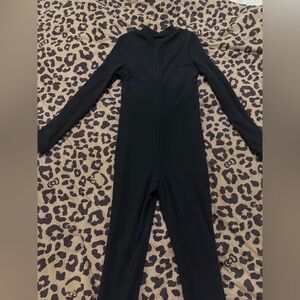 Women’s black one piece bodysuit fleece ski layer